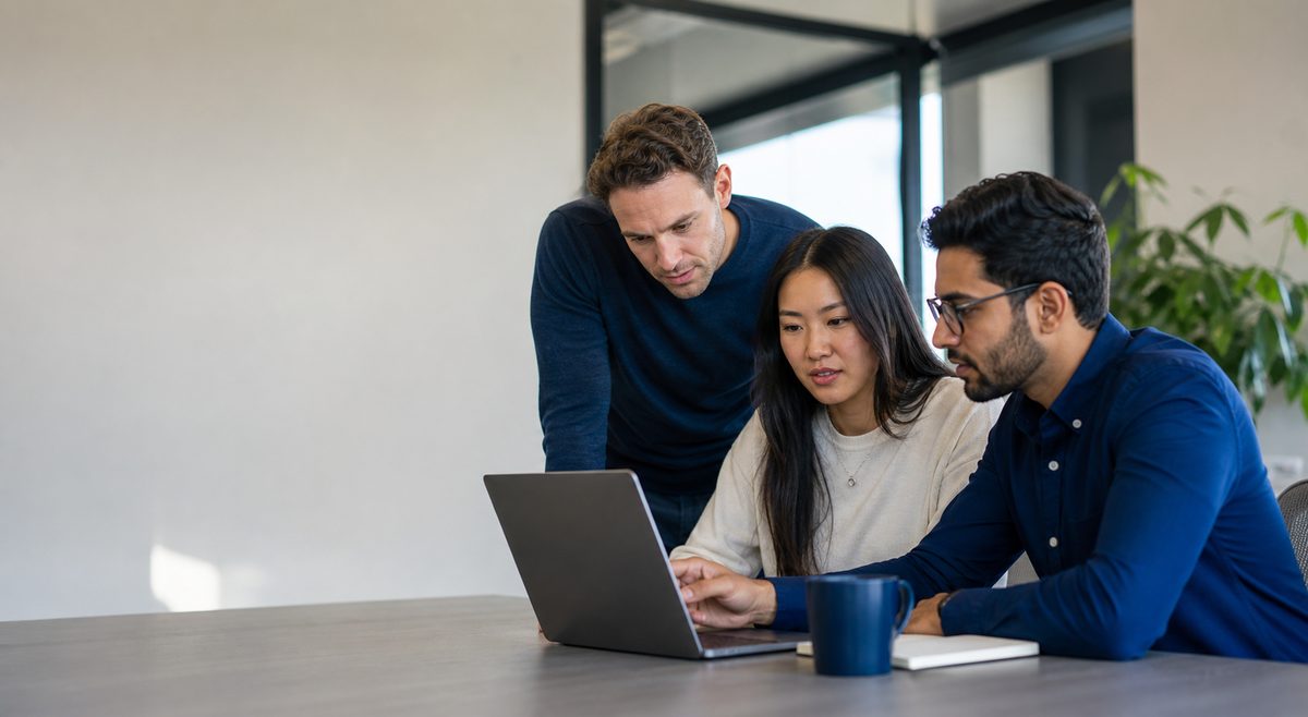 A team collaborating in a bright modern workspace